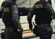 Doi mureșeni, reținuți pentru 24 de ore! La percheziții, polițiștii au găsit câteva mii de pachete de țigări și peste 150 litri de alcool
